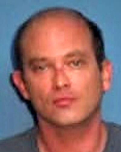 Suspect: Gary F. Day